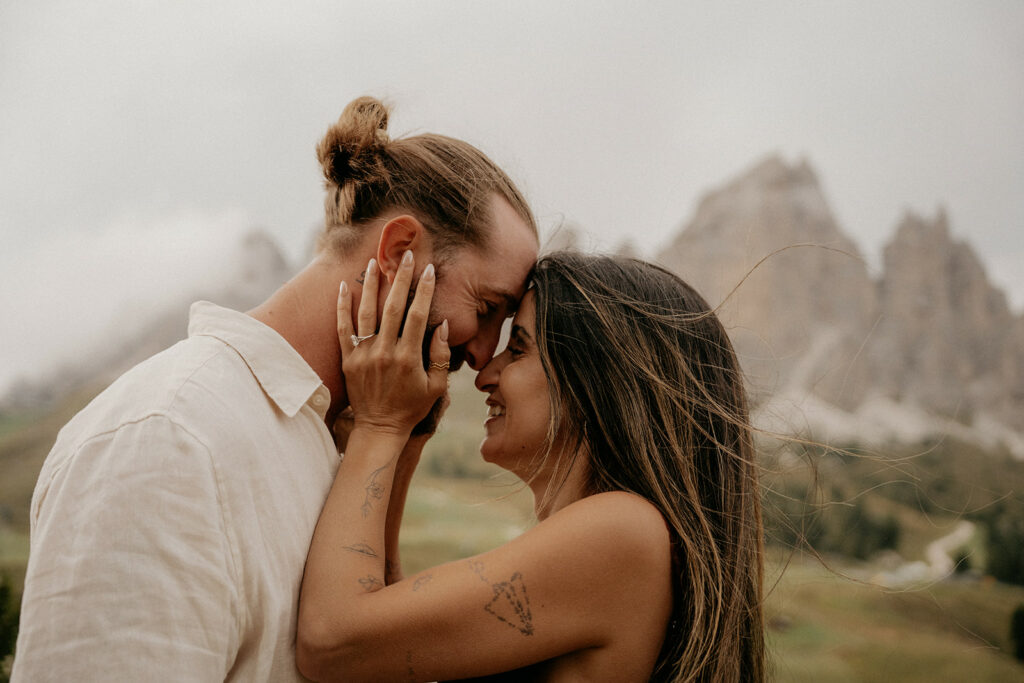 Couple embracing in mountain landscape