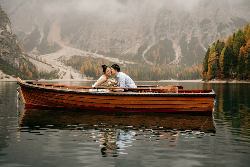 Couple in boat on mountain lake