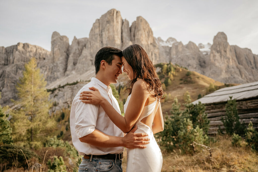 Couple embracing in scenic mountain landscape