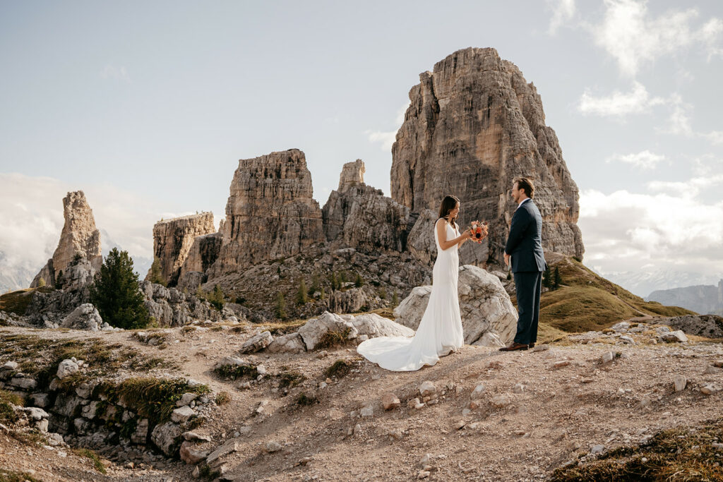 Couple wedding ceremony in mountain landscape