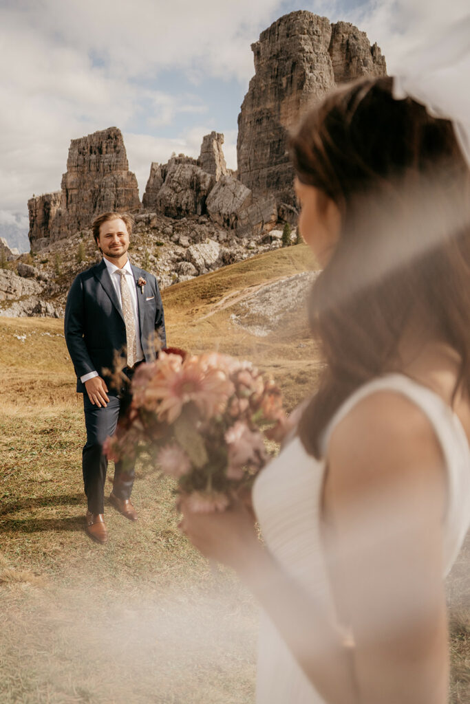 Bride and groom in mountain landscape ceremony