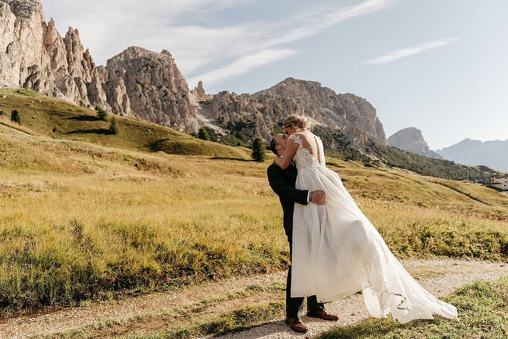 Bride and groom in scenic mountain landscape